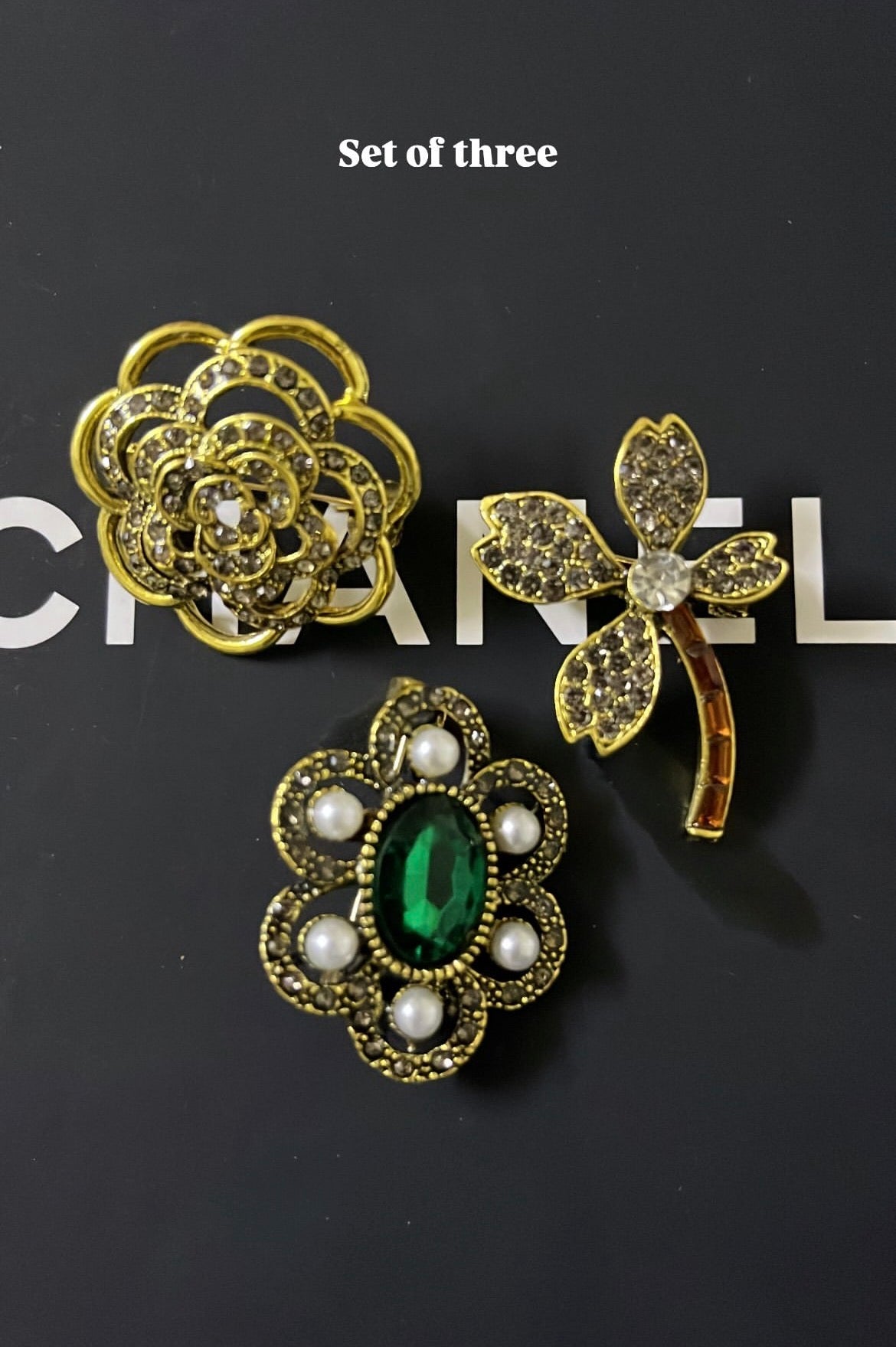 Set of three brooches